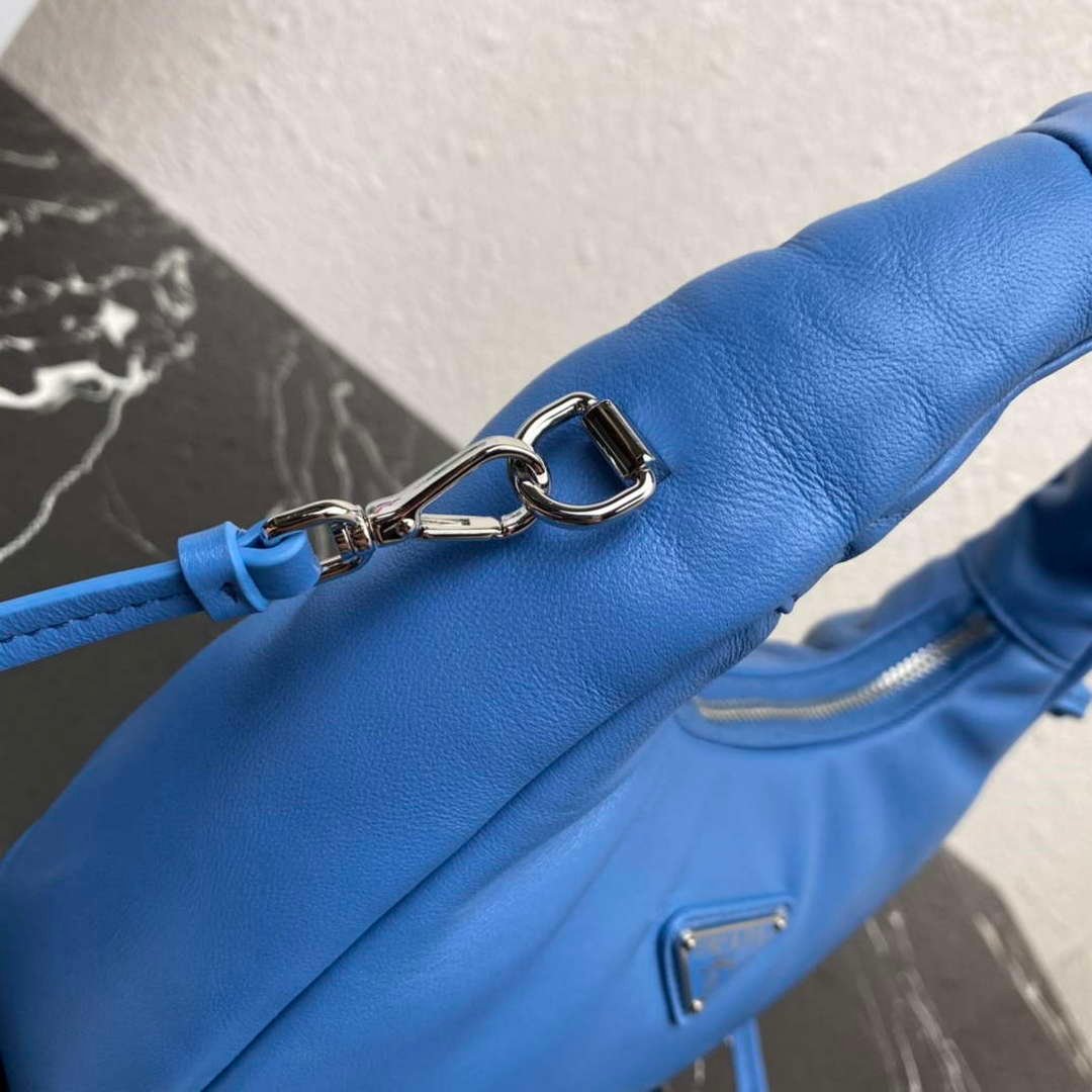 65324c31a2deb.jpg Replica Prada 1BA384 Prada Soft Padded Nappa Leather Mini Bag Light Blue