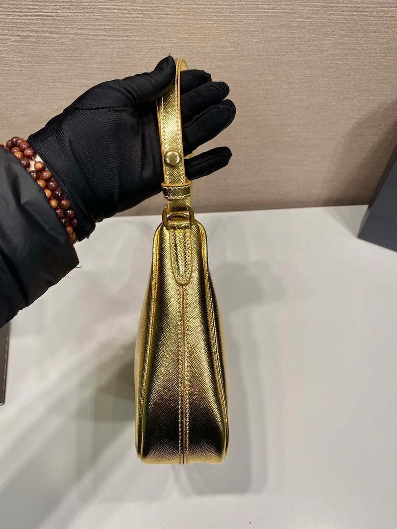 65324c8943608.jpg Replica Prada 1BC204 Saffiano Leather Mini-Bag Gold