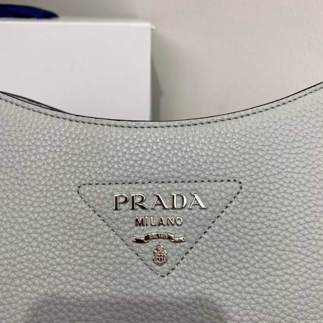 65324e342a531.jpg Replica Prada Leather hobo bag 1BC073 Gray