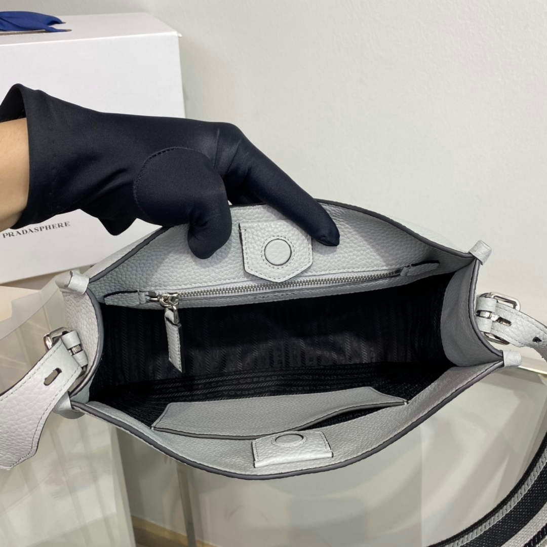 65324e3889dff.jpg Replica Prada Leather hobo bag 1BC073 Gray