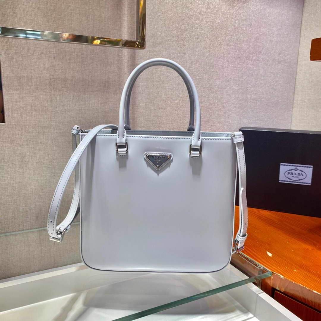 Our Factory offer best Designer HIGH quality replica handbags in cheaper price! Up to 70% discount now. Quality Guarantee! Fast Shipping Worldwide Replica Prada 1BA330 Brushed Leather Tote Bag Light Blue