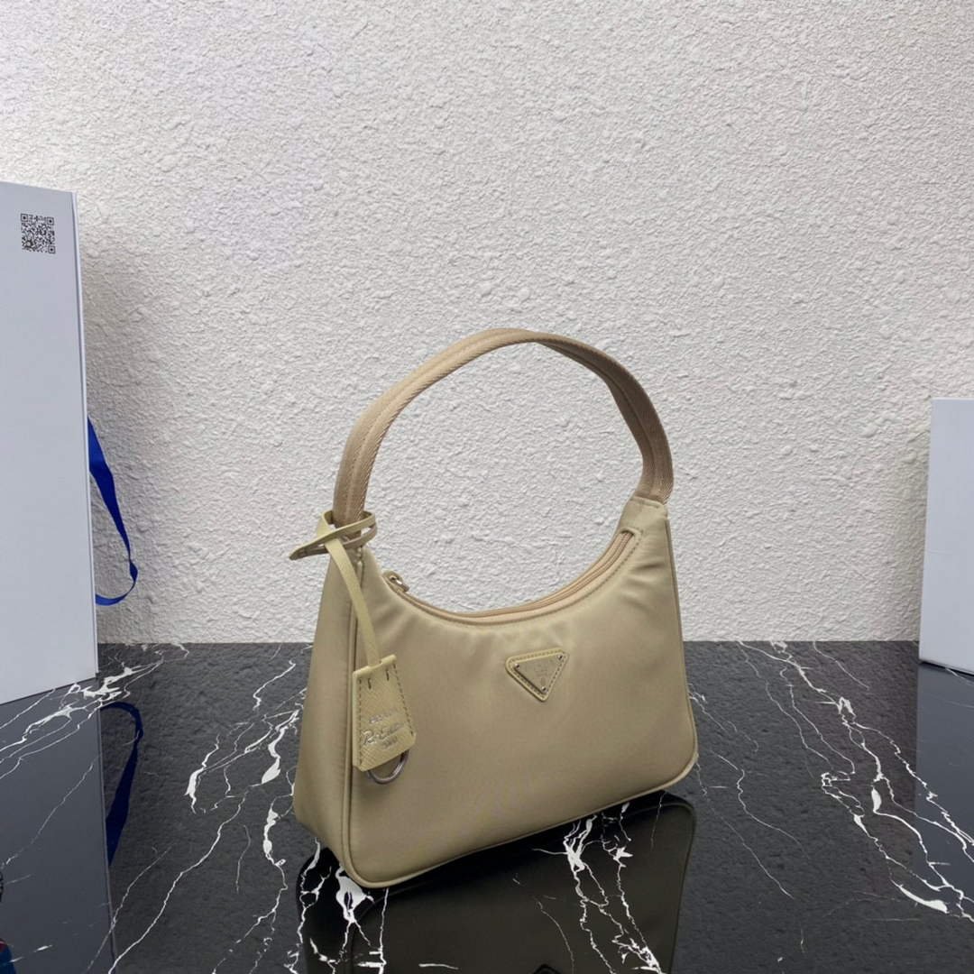 653254a7f3d1e.jpg Replica Prada 1NE515 Re-Nylon Re-Edition 2000 mini-bag Apricot