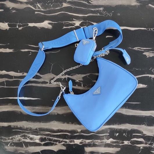 Our Factory offer best Designer HIGH quality replica handbags in cheaper price! Up to 70% discount now. Quality Guarantee! Fast Shipping Worldwide Replica Prada 1BH204 Prada Re-Edition 2005 Nylon Bag Blue