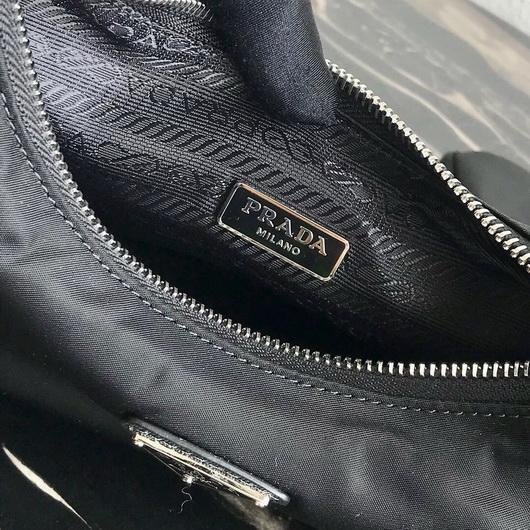 Our Factory offer best Designer HIGH quality replica handbags in cheaper price! Up to 70% discount now. Quality Guarantee! Fast Shipping Worldwide Replica Prada 1BH204 Prada Re-Edition 2005 Nylon Bag Black