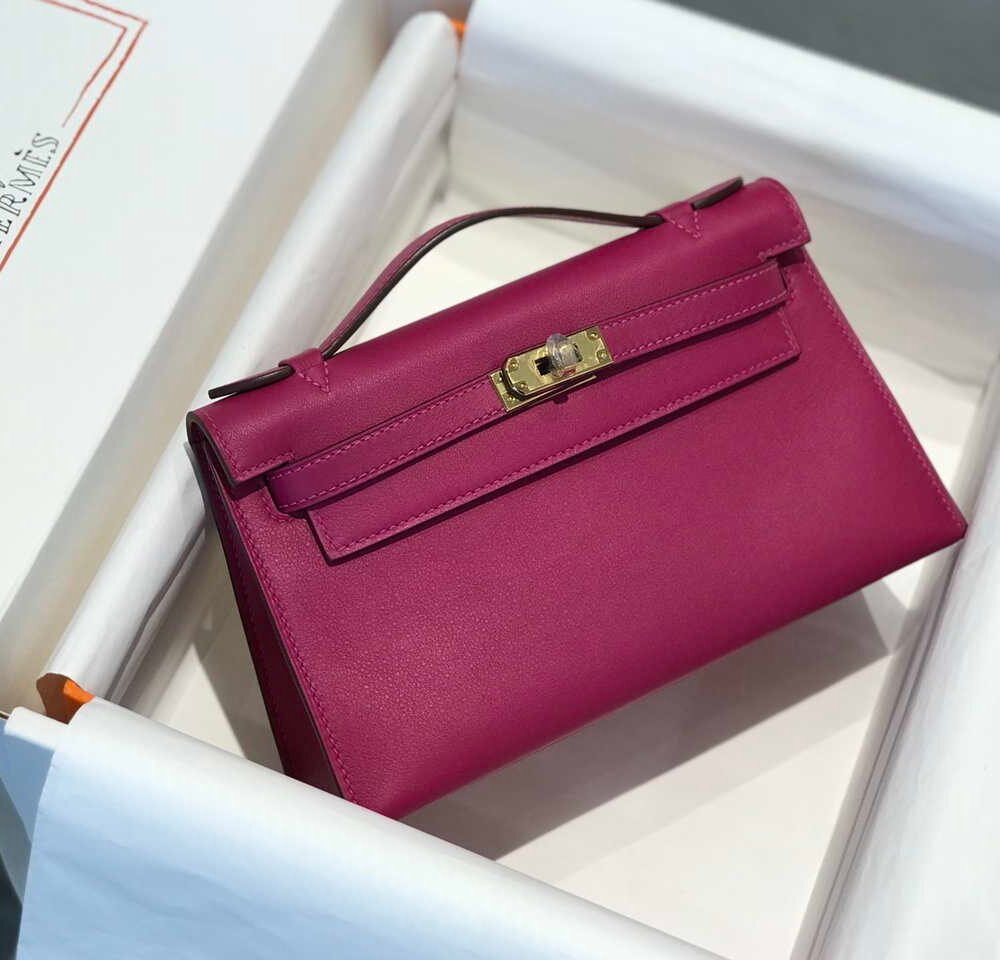 653279b96596c.jpg Replica Hermes Kelly Pouchette Swift Leather clutch bag Gold H230275