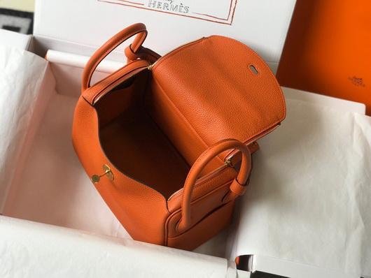Our Factory offer best Designer HIGH quality replica handbags in cheaper price! Up to 70% discount now. Quality Guarantee! Fast Shipping Worldwide Replica Hermes Lindy 26cm Designer Tote Shoulder Bags Orange Gold