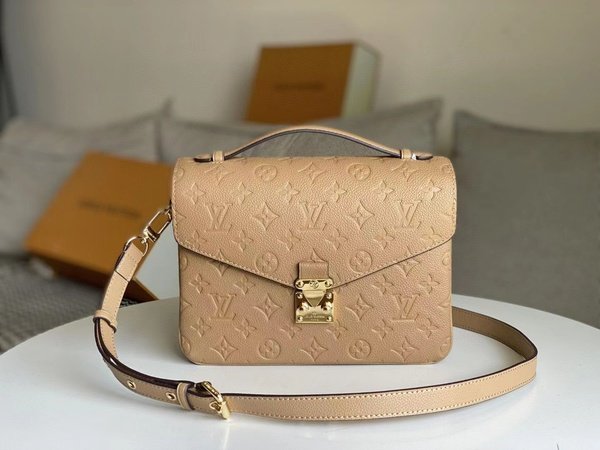 Replica Louis Vuitton Pochette Metis Monogram Empreinte Cream M44738