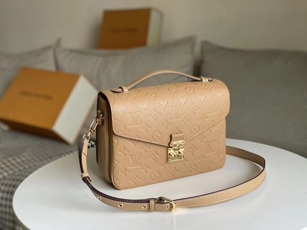 Replica Louis Vuitton Pochette Metis Monogram Empreinte Cream M44738