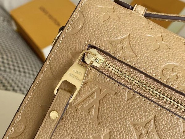 Replica Louis Vuitton Pochette Metis Monogram Empreinte Cream M44738