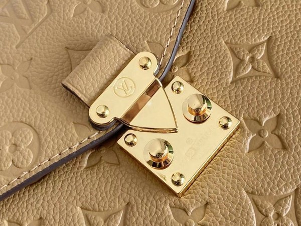 Replica Louis Vuitton Pochette Metis Monogram Empreinte Cream M44738