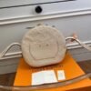 Replica Louis Vuitton Boite Chapeau Souple MM Monogram Empreinte M45276 BLV487