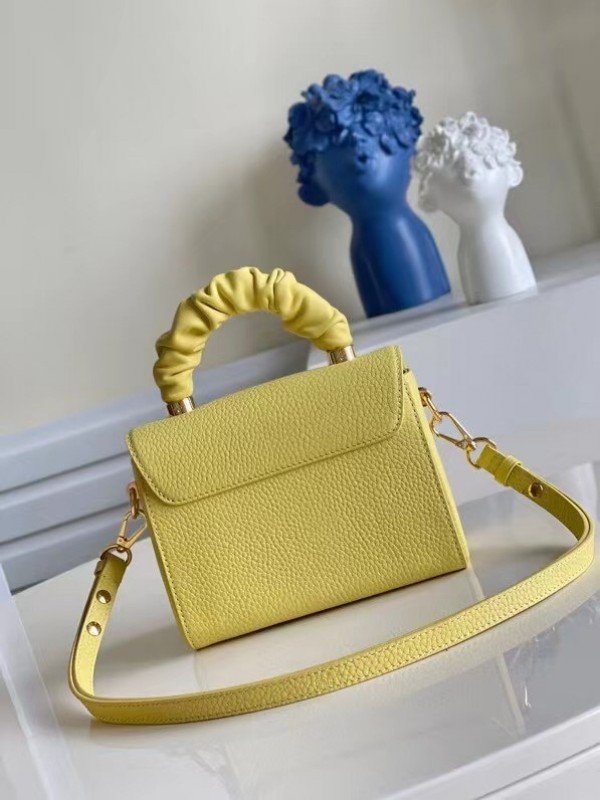Replica Louis Vuitton Twist PM Bag In Yellow Taurillon Leather M58571 BLV713