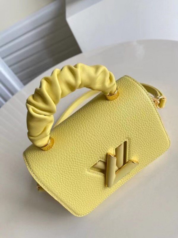 Replica Louis Vuitton Twist PM Bag In Yellow Taurillon Leather M58571 BLV713