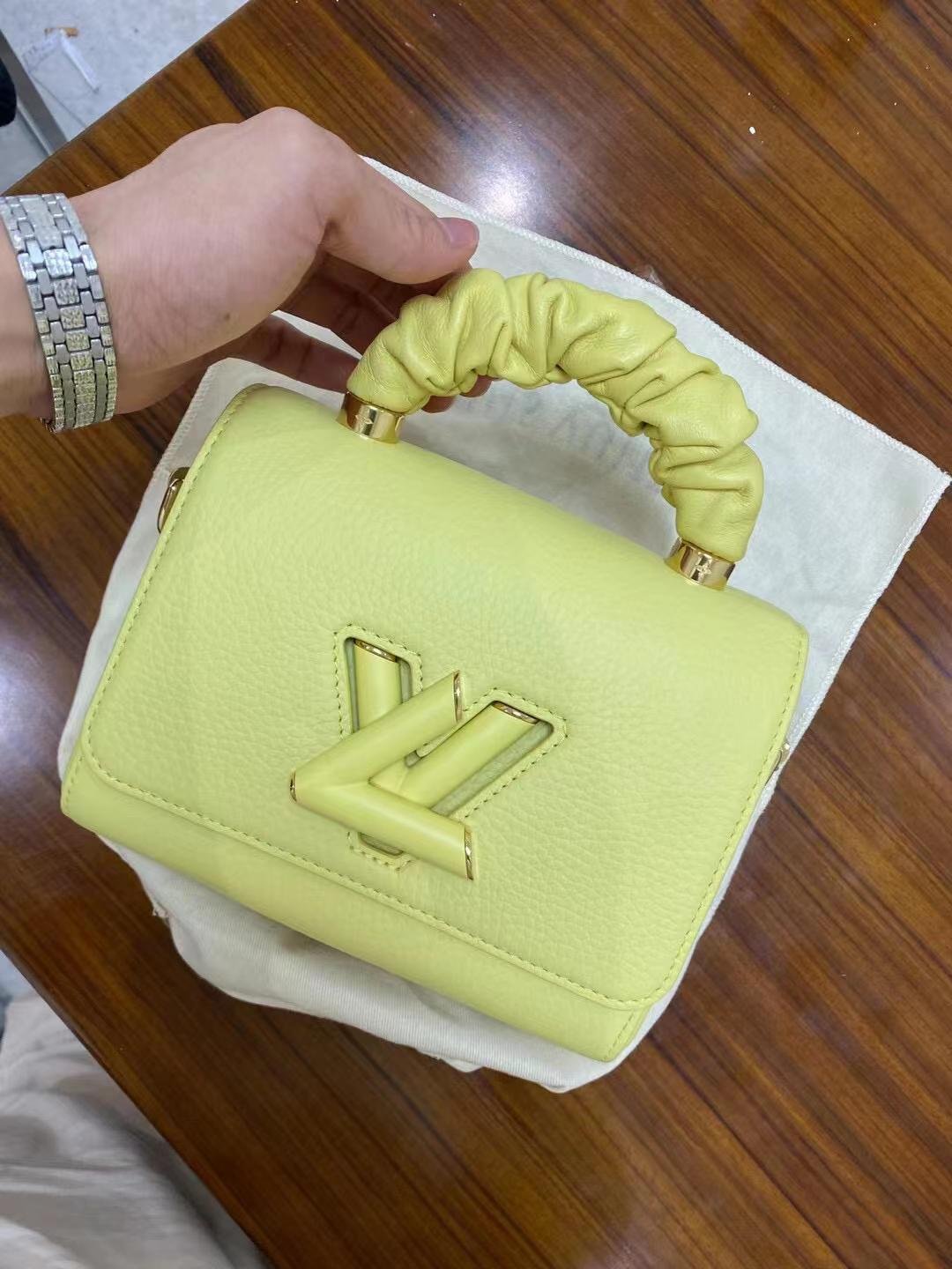 Replica Louis Vuitton Twist PM Bag In Yellow Taurillon Leather M58571 BLV713 photo review